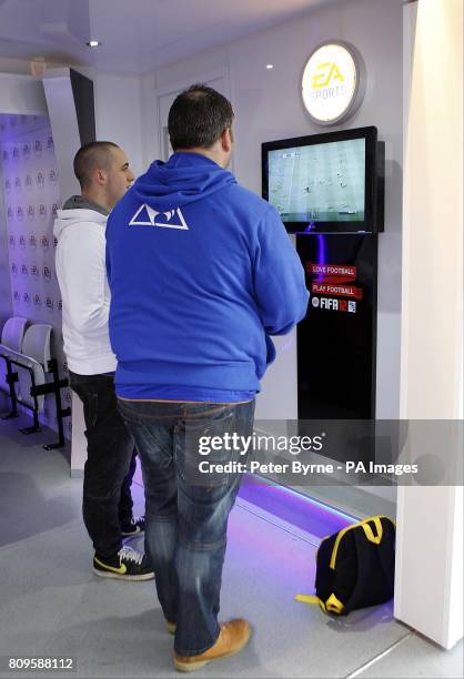 Fans play FIFA12 in the EA Sports promotional trailer outside of Goodison Park