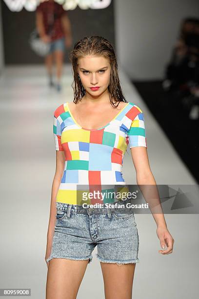 Model showcases an outift by designer Vanguard as part of the New Generation catwalk show during the fifth day of the Rosemount Australian Fashion...