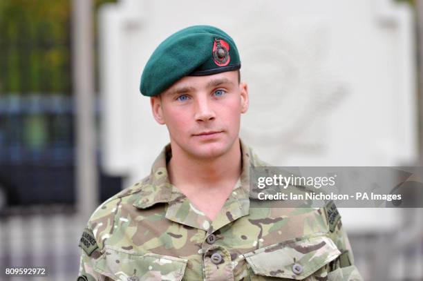 Marine Richard Harry Butcher, from Manchester, at Wellington Barracks, London, as personnel from 3 Commando Brigade prepare to march to Parliament...