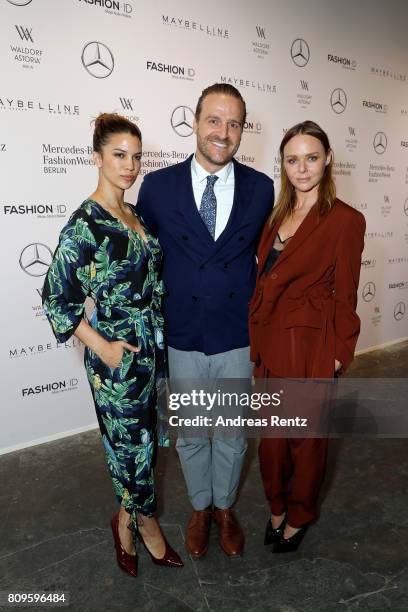 Kenya Kinski-Jones, John Cloppenburg and Stella McCartney attend the 'Designer for Tomorrow' show during the Mercedes-Benz Fashion Week Berlin...