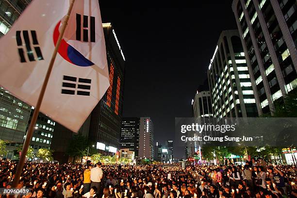 South Korean protesters participate in a candlelight vigil against a recent Korea-U.S. Agreement on the expansion of U.S. Beef imports on May 2, 2008...