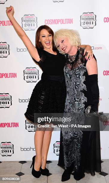 Kylie Minogue with Debbie Harry, winner of the 'Ultimate Icon' award, in the press room at the Cosmopolitan Ultimate Women Awards at Banqueting...