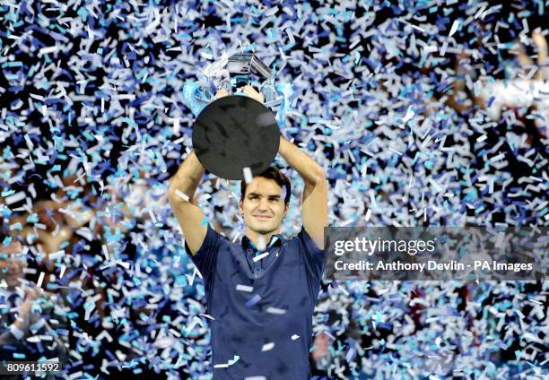 Switzerland's Roger Federer celebrates his victory against France's Jo-Wilfried Tsonga during the final of the Barclays ATP World Tour Finals at the...