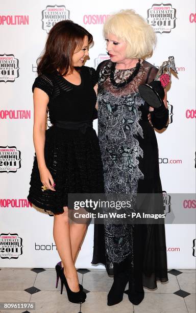 Kylie Minogue with Debbie Harry, winner of the 'Ultimate Icon' award, in the press room at the Cosmopolitan Ultimate Women Awards at Banqueting...