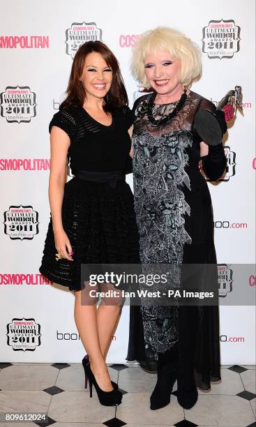 Kylie Minogue with Debbie Harry, winner of the 'Ultimate Icon' award, in the press room at the Cosmopolitan Ultimate Women Awards at Banqueting...