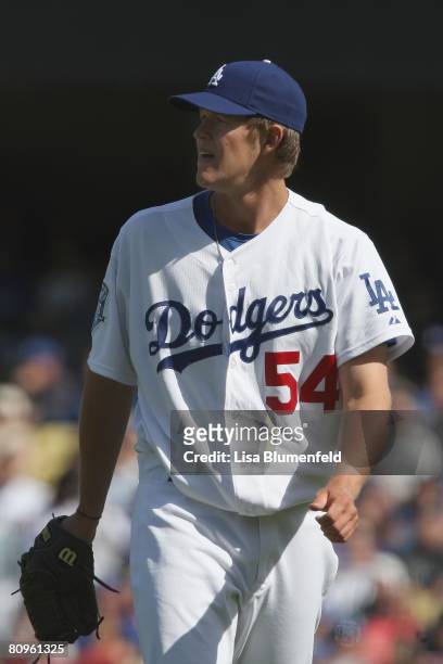 Clayton Kershaw of the Los Angeles Dodgers walks back to the dugout during the game against the Boston Red Sox at Dodger Stadium on March 30, 2008 in...