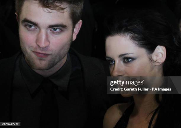 Robert Pattinson and Kristen Stewart arriving for the UK premiere of The Twilight Saga: Breaking Dawn Part 1, at the Westfield Stratford City,...