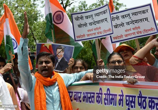 Members of Swadeshi Jagaran Manch during a protest against China near Chinese embassy in New Delhi on Tuesday.The demonstration was held after...