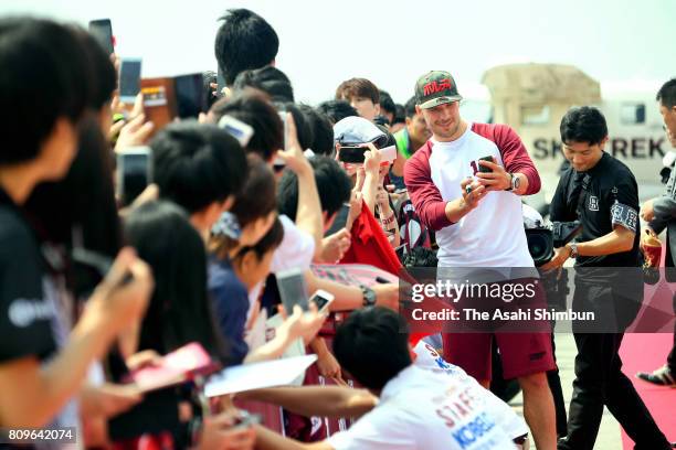 Vissel Kobe new player Lukas Podolski greets fans on arrival at kObe Airport on July 6, 2017 in Kobe, Hyogo, Japan.