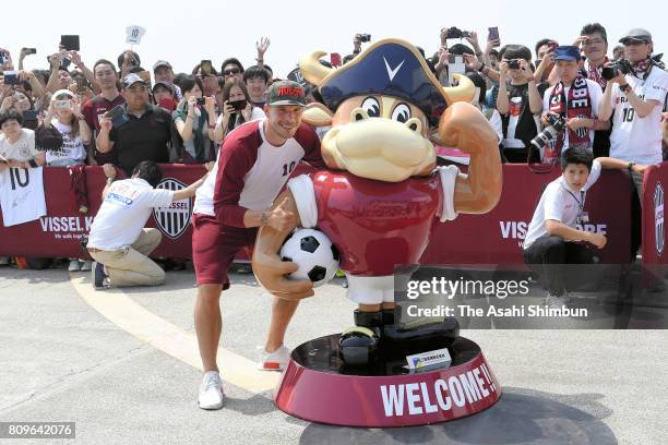 Vissel Kobe new player Lukas Podolski poses for photographs with fans on arrival at kObe Airport on July 6, 2017 in Kobe, Hyogo, Japan.