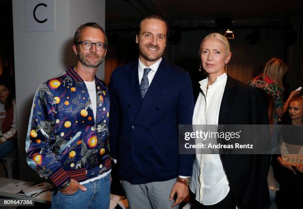 Marcus Luft, John Cloppenburg and Christiane Arp attend the 'Designer for Tomorrow' show during the Mercedes-Benz Fashion Week Berlin Spring/Summer...