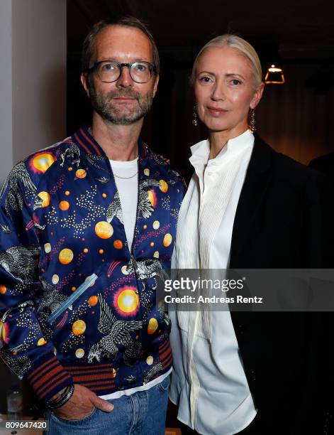 Marcus Luft and Christiane Arp attend the 'Designer for Tomorrow' show during the Mercedes-Benz Fashion Week Berlin Spring/Summer 2018 at Kaufhaus...