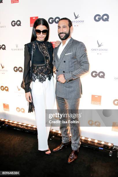 Rebecca Mir and Massimo Senato attend the GQ Mension Style Party 2017 at Austernbank on July 5, 2017 in Berlin, Germany.