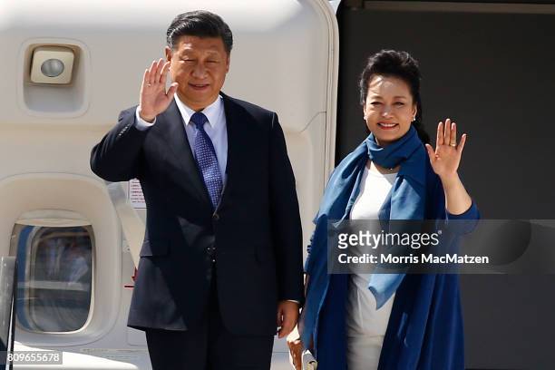 Chinese President Xi Jinping with chinese Lirst Lady Peng Liyuan arrive at Hamburg Airport for the Hamburg G20 economic summit on July 6, 2017 in...