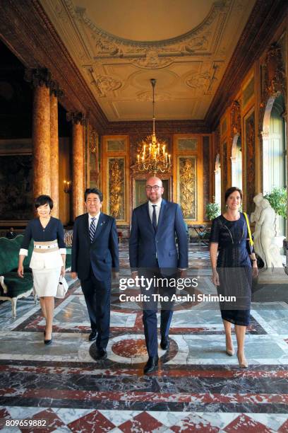 Prime Minister Shinzo Abe and his wife Akie walk with Belgium Prime Minister Charles Michel and his partner Amelie Derbaudrenghien prior to their...