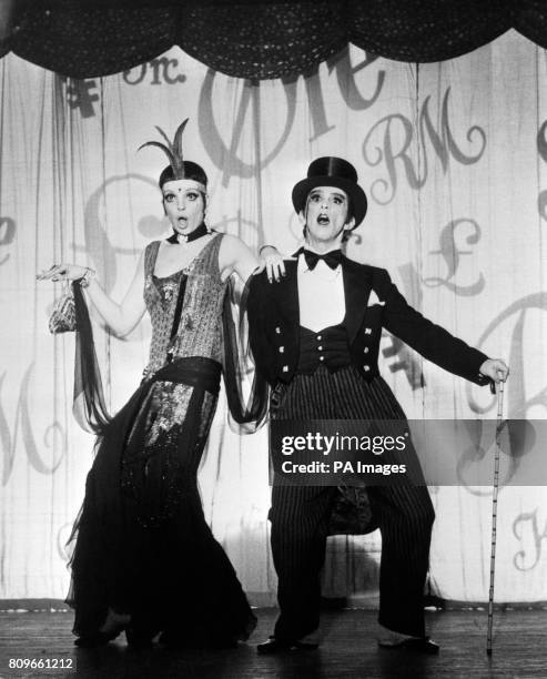 Joel Grey partners Liza Minnelli, daughter of the unforgettable Judy Garland, in 'Money, Money, Money, a scene from Cinerama's new musical drama,...