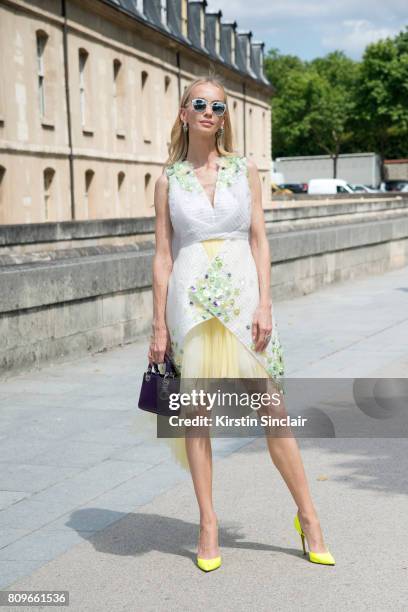 Model and Founder of Vaara active wear Tatiana Korsakova wears a Delpozo dress, Dior bag, jewellery and sunglasses, Duccio Venturi shoes day 2 of...