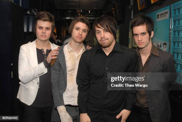 Spencer Smith , Ryan Ross , Jon Walker , and Brendon Urie , of Panic! At the Disco