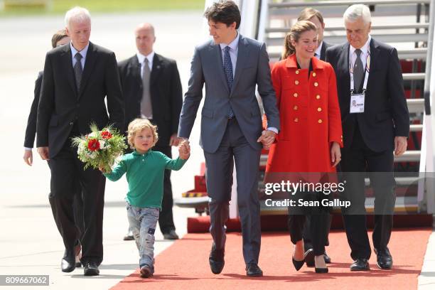 Canadian Prime Minister Justin Trudeau, his wife Sophie Gregoire and son Hadrien arrive at Hamburg Airport for the Hamburg G20 economic summit on...