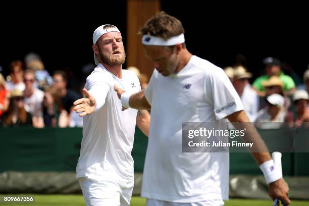 Sam Groth of Australia and Robert Lindstedt of Sweden celebrate during the Gentlemen's Doubles first round match against Guillermo Duran of Argentina...