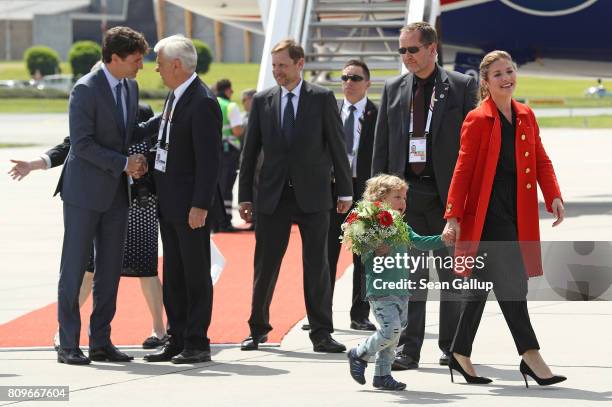 Canadian Prime Minister Justin Trudeau , his wife Sophie Gregoire and son Hadrien arrive at Hamburg Airport for the Hamburg G20 economic summit on...