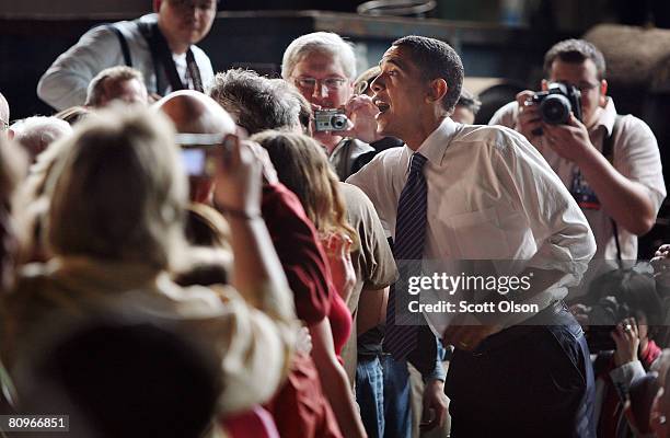 Democratic presidential candidate Senator Barack Obama greets voters following a town hall stlye meeting at the Munster Steel Company May 2, 2008 in...