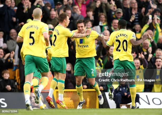 Norwich City's Russell Martin celebrates with team-mates after scoring his team's opening goal