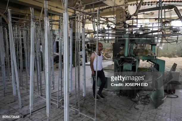 Picture shows the interior of an inactive textile factory in Aleppo's northwest Layramoun industrial district on July 5, 2017. Six months after...