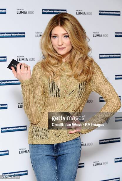 Nicola Roberts launches the Nokia Lumia 800 at the Carphone Warehouse on Oxford Street in London.