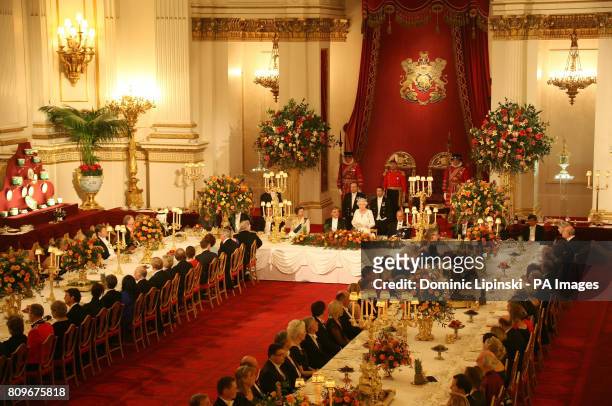 Queen Elizabeth II and President of Turkey Abdullah Gul flanked by the Princess Royal and the Duke of Edinburgh as they attend a State Banquet at...