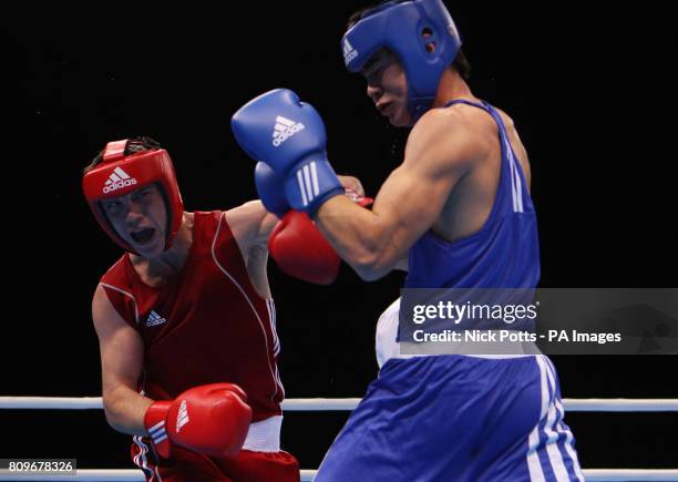 Great Britain's Freddie Evans wins his fight against Uzbekistan's Jaloliddin Uktamov in the Men's Welter Weight during the Boxing International...