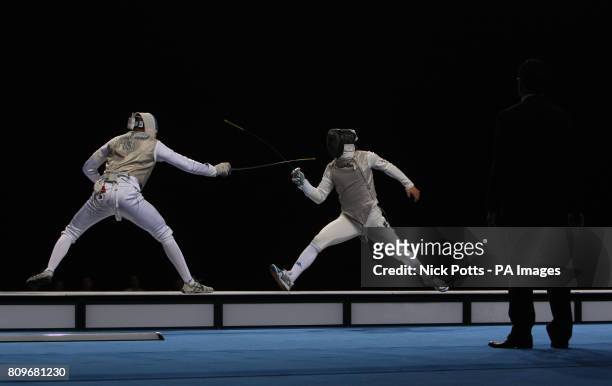 S Miles Chamley-Watson in action against Italy's Tommaso Lari during the semi final during the Fencing International Invitational at the Excel Arena,...