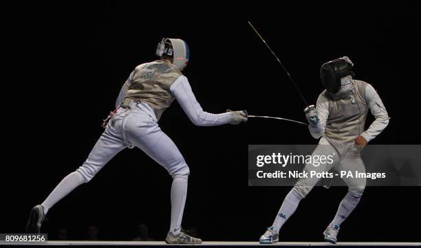 S Miles Chamley-Watson in action against Italy's Tommaso Lari during the semi final of the Fencing International Invitational at the Excel Arena,...