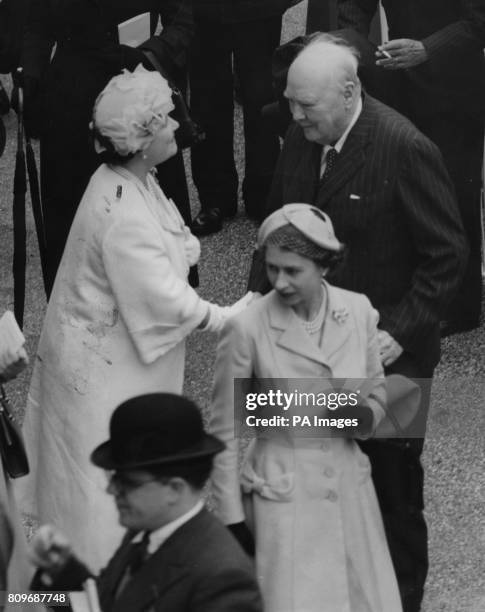 Queen Elizabeth II and the Queen Mother, with Sir Winston Churchill after his two year old Collusion had won the Rosslyn Stakes at Ascot.