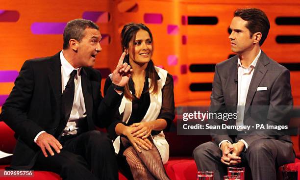Antonio Banderas, Salma Hayek and Jimmy Carr share a joke during the filming of the Graham Norton Show at The London Studios, south London, to be...