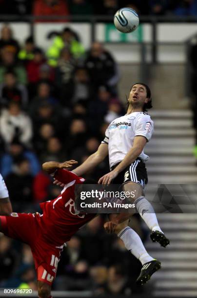 Derby County's Shaun Barker rises above Bristol City's Nicky Maynard during the npower Football League Championship match at Pride Park, Derby.