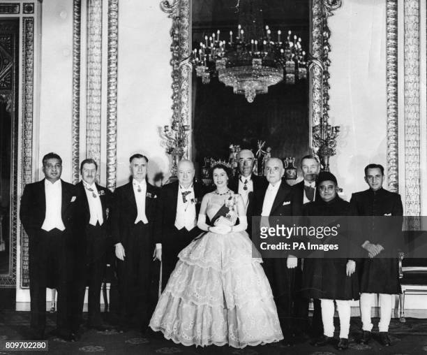 Queen Elizabeth II with Prime Ministers and senior Ministers attending the Commonwealth Economic Conference in Buckingham Palace. Left to right; Don...
