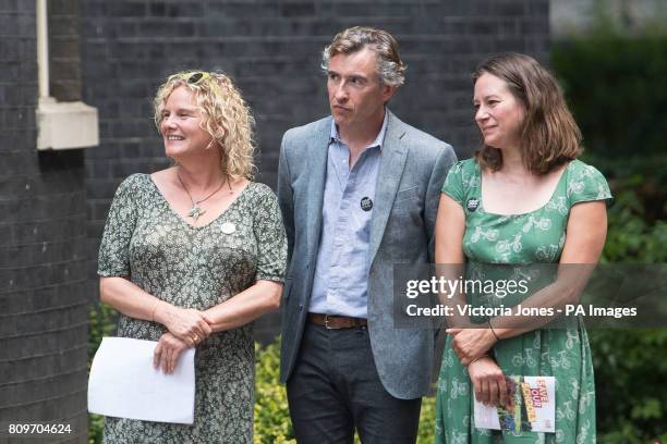 Steve Coogan with Save Our Schools campaign founders Alison Ali and Anna Cole deliver tens of thousands of messages of love from more than 60 schools...
