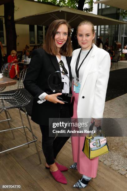 Designers Lara Krude and Emma Gimnes attend the 'Designer for Tomorrow' after show reception during the Mercedes-Benz Fashion Week Berlin...