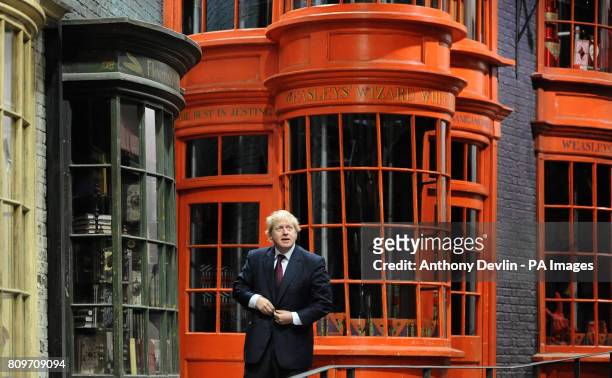 Mayor of London Boris Johnson walks down Diagon Alley as he visits the new attraction 'The Making of Harry Potter' at Warner Brothers studios in...