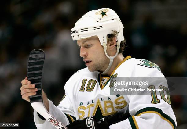 Brenden Morrow of the Dallas Stars inspects the blade of his stick during game five of the Western Conference Semifinals of the 2008 NHL Stanley Cup...