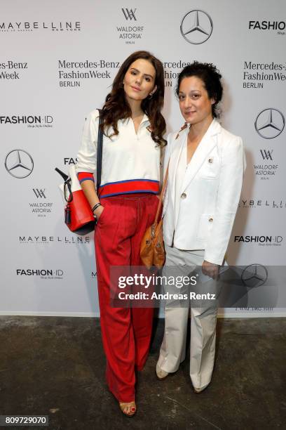 Ruby O. Fee and guest attend the 'Designer for Tomorrow' show during the Mercedes-Benz Fashion Week Berlin Spring/Summer 2018 at Kaufhaus Jandorf on...