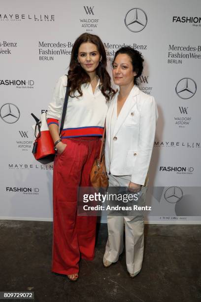 Ruby O. Fee and guest attend the 'Designer for Tomorrow' show during the Mercedes-Benz Fashion Week Berlin Spring/Summer 2018 at Kaufhaus Jandorf on...