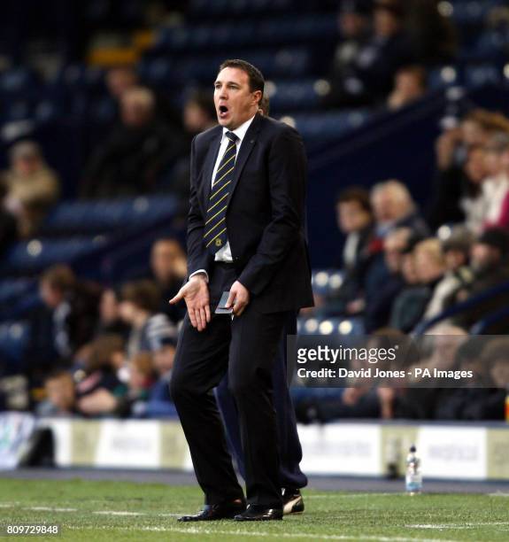 Cardiff City's manager Malky Mackay urges his team during the FA Cup, Third Round match at The Hawthorns, West Bromwich.