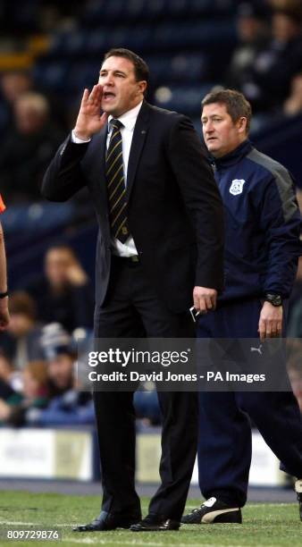 Cardiff City's manager Malky Mackay urges his team during the FA Cup, Third Round match at The Hawthorns, West Bromwich.