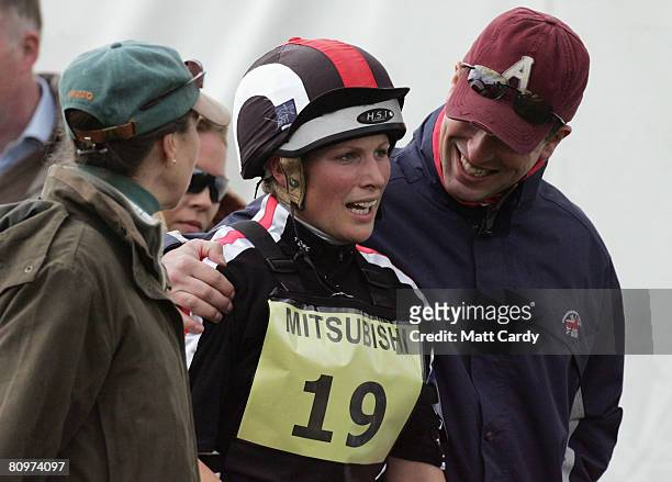 Zara Phillips chats with her mother Princess Anne Princess Royal and her brother Peter Phillips after she rode Glenbuck in the cross country during...