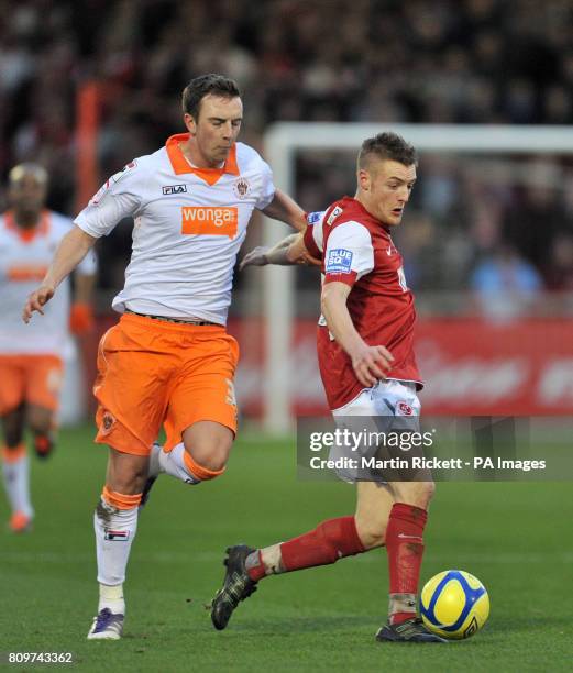 Fleetwood Town's Jamie Vardy battles for the ball with Blackpool's Danny Wilson during the FA Cup, Third Round match at Highbury Stadium, Fleetwood.