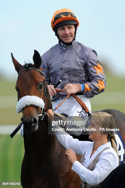 Dandy ridden by jockey Jimmy Fortune