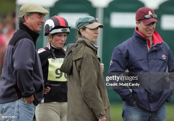 Mark Phillips, Zara Phillips, Princess Anne and Peter Phillips chat following the cross country during the Badminton Horse Trials on May 3 2008 in...