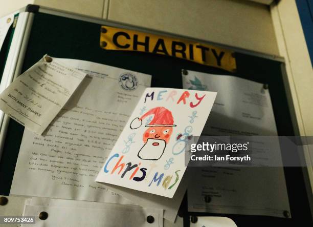 Christmas card is pinned to a noticeboard onboard the decommissioned Brent Delta Topside oil platform at the Able UK site at Seaton Port on July 6,...
